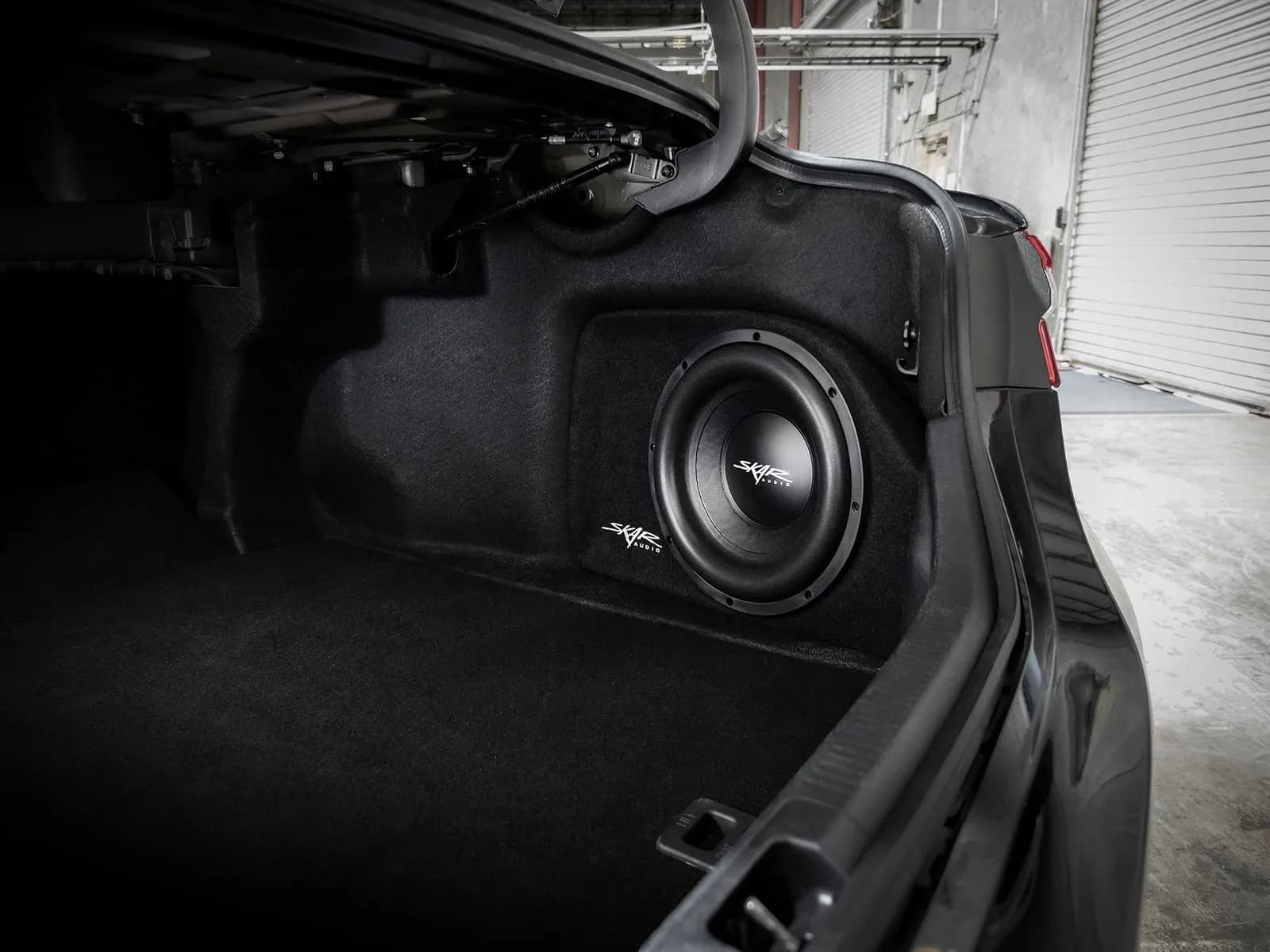 Skar Audio VS-1X12TOYCAM-2018-UP enclosure installation example — view 1