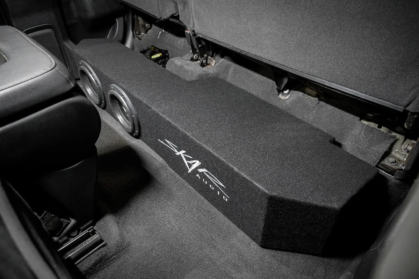 Skar Audio L-EVL-VS-2X8GM-2019-UP-DCAB-V enclosure installation example — view 2