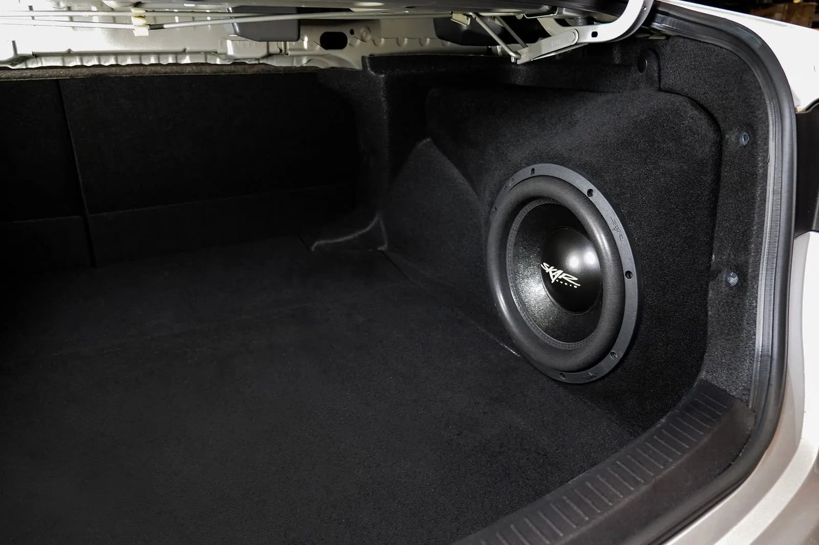 Skar Audio L-SVR-VS-1X12TOYCOR-2020-UP enclosure installation example — view 1