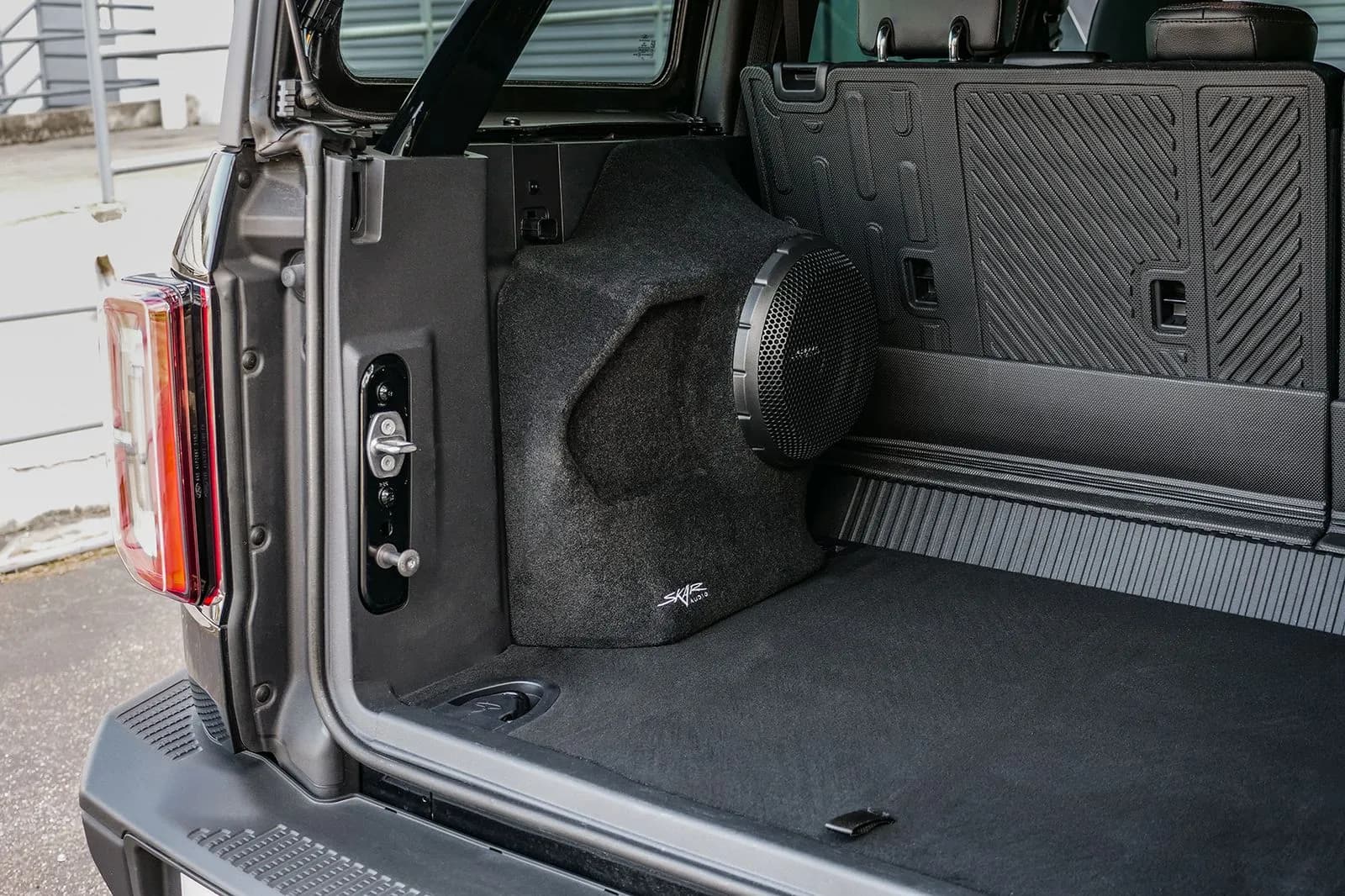 Skar Audio L-VS-1X10FORDBRO-2021-UP enclosure installation example — view 2