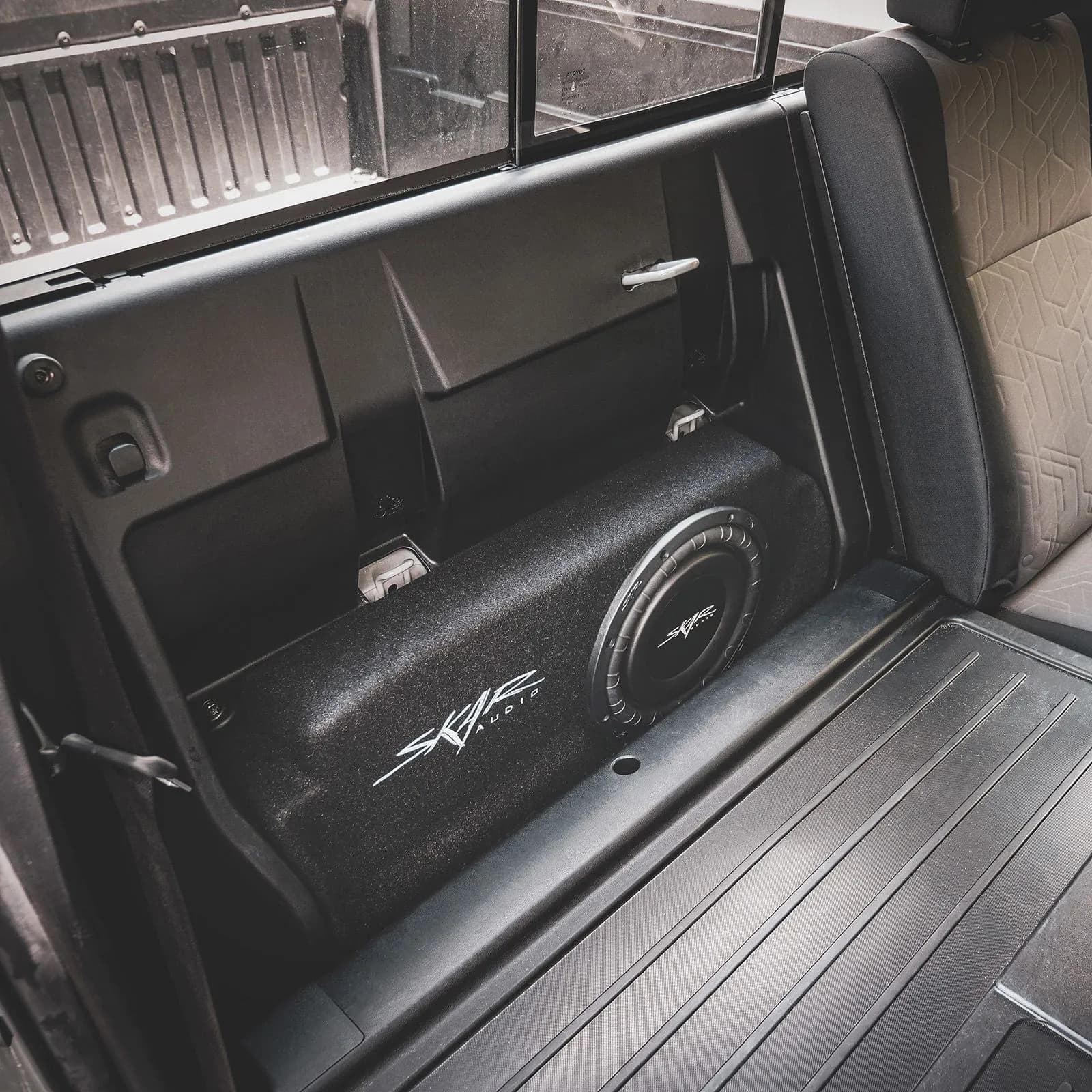 Skar Audio L-VS-1X10TOY-TACOM-2016-UP-DBLCAB enclosure installation example — view 3