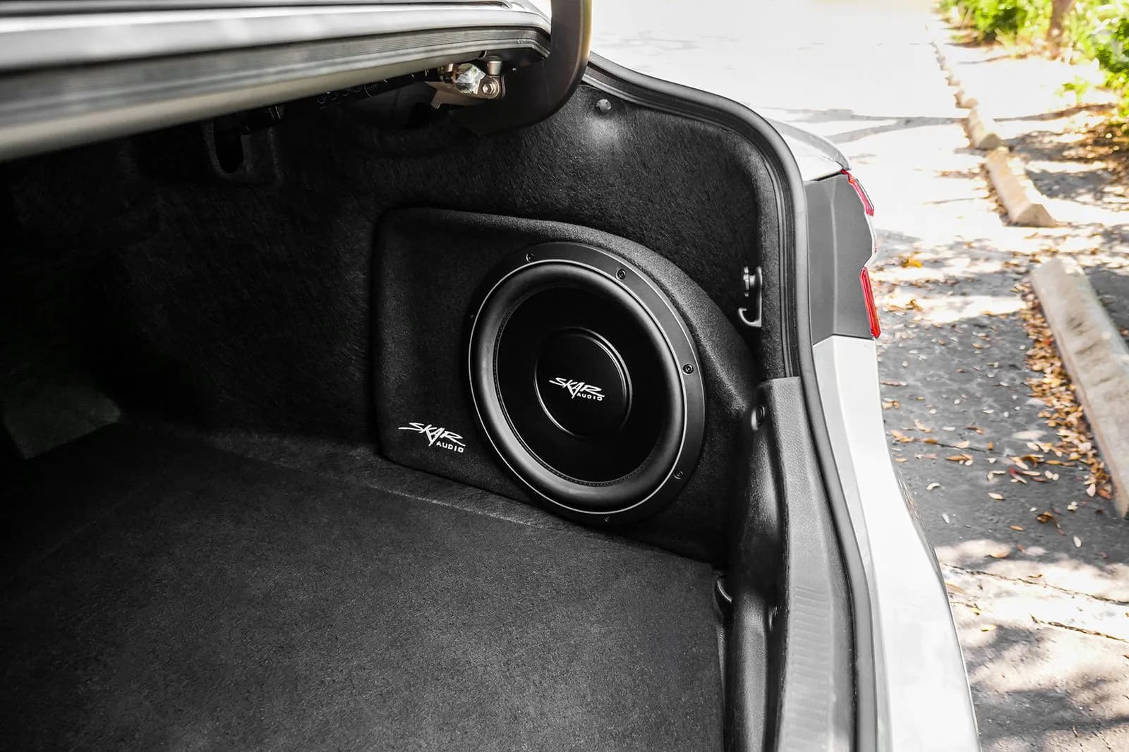 Skar Audio L-VS-1X12TOYCAM-2018-UP enclosure installation example — view 1
